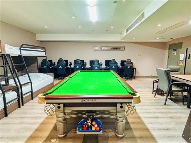 元主题房型打造年轻人“搭子社交”新主场pg电子入口瞄准3亿Z世代爱电竞以多(图2)